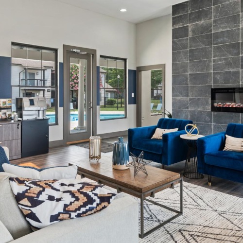 Settle into comfort at Magnolia Falls a living room with a fireplace