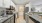 a kitchen with white cabinets
