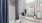 spacious bathroom with upgraded countertops and cabinetry